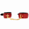 La marca KINK WRIST RESTRAINT nos facilita esta imagen de su producto KINK - MUÑEQUERAS JOANNA ANGEL ROJO AJUSTABLE CON CADENA DORADO 16.5-26 CM X 4 CM para nuestro catálogo.