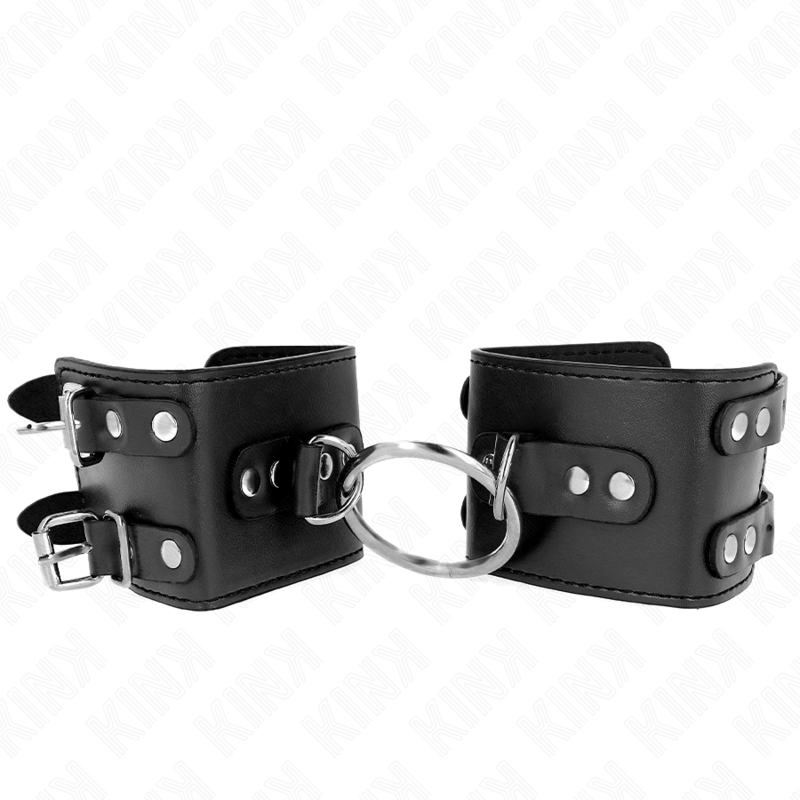 La marca KINK WRIST RESTRAINT nos facilita esta imagen de su producto KINK - MUÑEQUERAS FIJAS CON ANILLA Y TACHUELAS NEGRO AJUSTABLE 17-22 CM X 6.5 CM para nuestro catálogo.