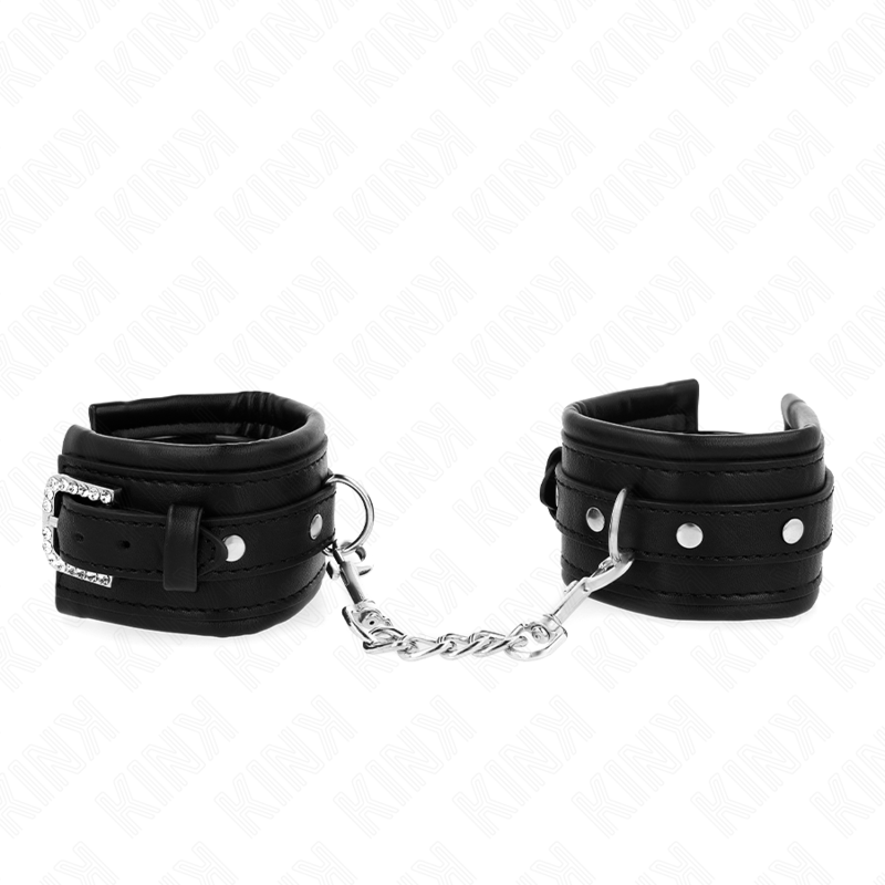 La marca KINK WRIST RESTRAINT nos facilita esta imagen de su producto KINK - MUÑEQUERAS NEGRO CON HEBILLA DE DIAMANTES DE IMITACIÓN AJUSTABLE 25-32 CM X 5.5 CM para nuestro catálogo.