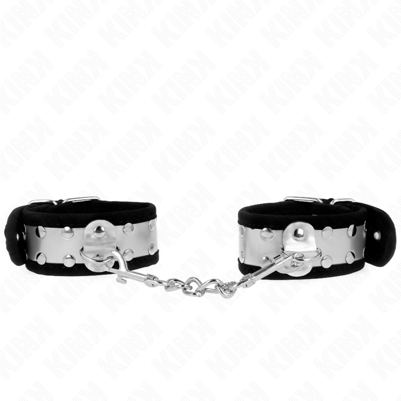 La marca KINK WRIST RESTRAINT nos facilita esta imagen de su producto KINK - MUÑEQUERAS FINAS NEGRO / PLATEADO 30 X 4 CM para nuestro catálogo.
