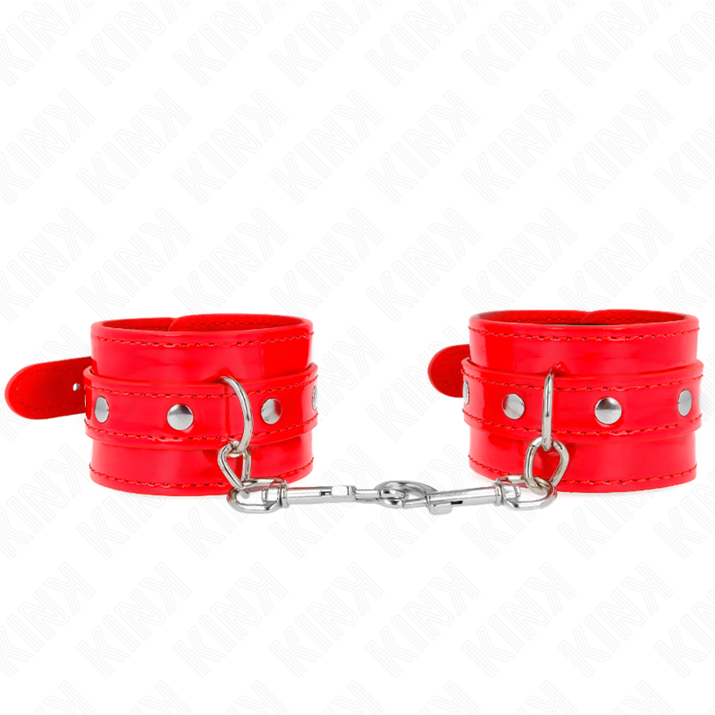 La marca KINK WRIST RESTRAINT nos facilita esta imagen de su producto KINK - MUÑEQUERAS CON TACHUELAS ROJO AJUSTABLE 23-33 CM para nuestro catálogo.